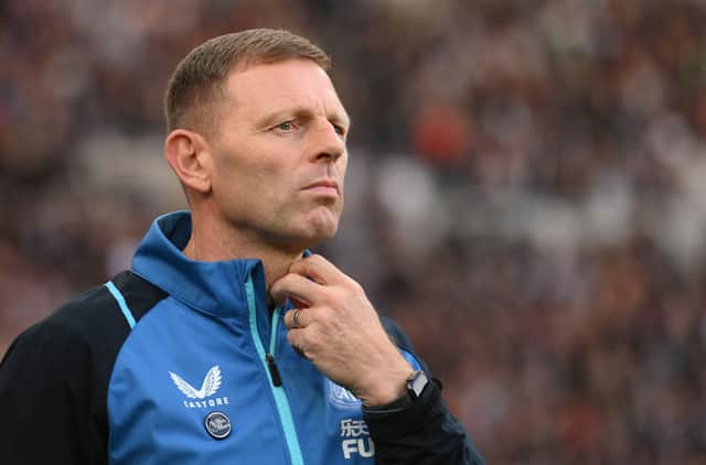 <p>Interim manager Graeme Jones looks on from the technical area before the Premier League match between Newcastle United and Chelsea at St. James Park on October 30, 2021 in Newcastle upon Tyne, England. </p>
