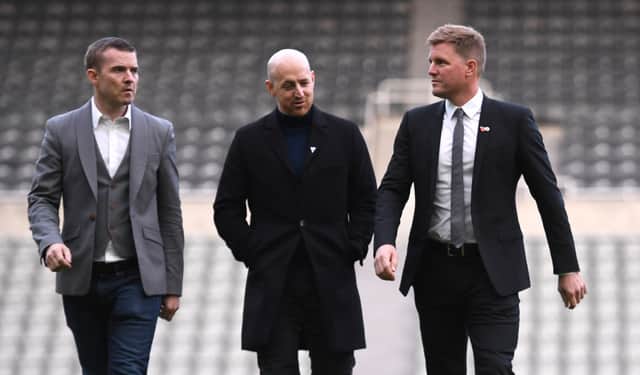 New Newcastle Head Coach Eddie Howe (r) chats with members of his management company on the pitch at his unveiling press conference at St. James Park on November 10, 2021 in Newcastle upon Tyne, England. (Photo by Stu Forster/Getty Images)