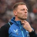 Assistant Head Coach Graeme Jones looks on from the technical area before the Premier League match between Newcastle United and Chelsea at St. James Park on October 30, 2021 in Newcastle upon Tyne, England. 