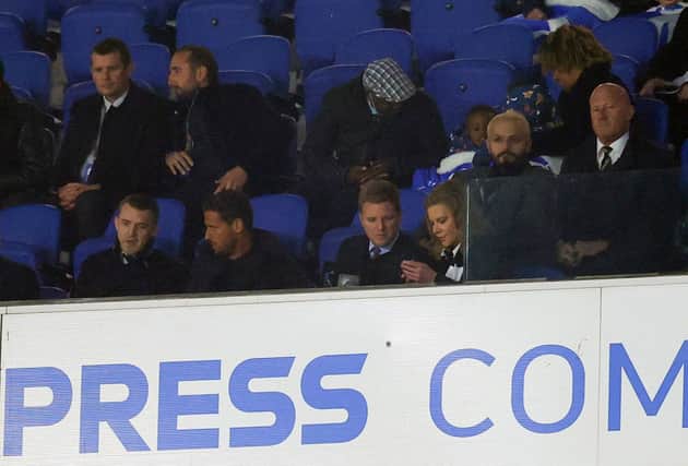 Eddie Howe watches from the stands with Jason Tindall and Newcastle United Director Amanda Staveley during the Premier League match between Brighton & Hove Albion and Newcastle United at American Express Community Stadium on November 06, 2021 in Brighton, England. 