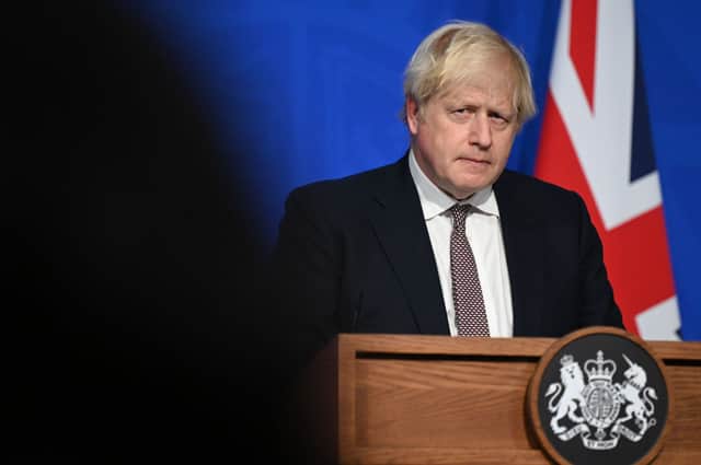 Prime Minister Boris Johnson addresses the media regarding the United Kingdom’s Covid-19 infection rate and vaccination campaign at Downing Street Briefing Room on November 15, 2021 in London, England. The prime minister and his advisers encouraged Britons to receive their Covid-19 vaccine booster when eligible.