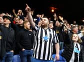 Newcastle United fans gesture during the Premier League match between Crystal Palace and Newcastle United at Selhurst Park on October 23, 2021 in London, England.