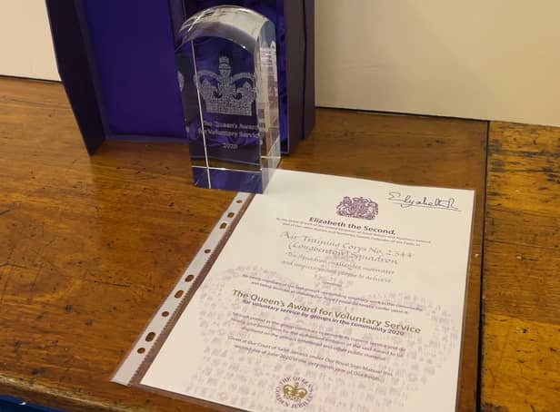 <p>Photo of Longbenton Sqaudron’s award from The Queen</p>