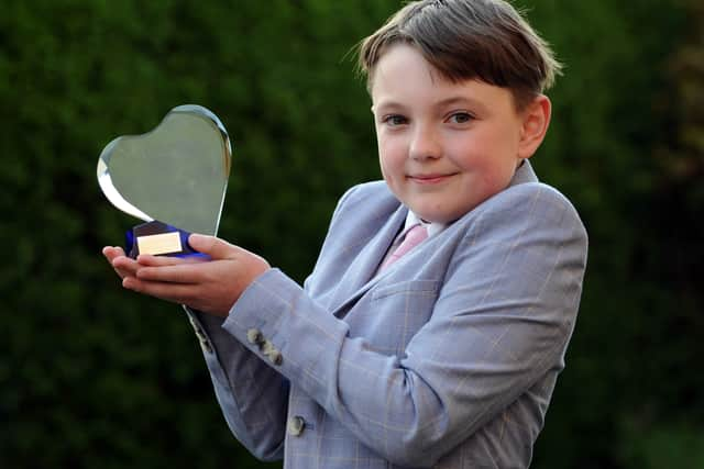 #LoveSouthTyneside winner 9-year-old Oliver Nicholson receives his award from the Mayor Cllr Norman Dick and Mayoress Mrs Jean Williamson.