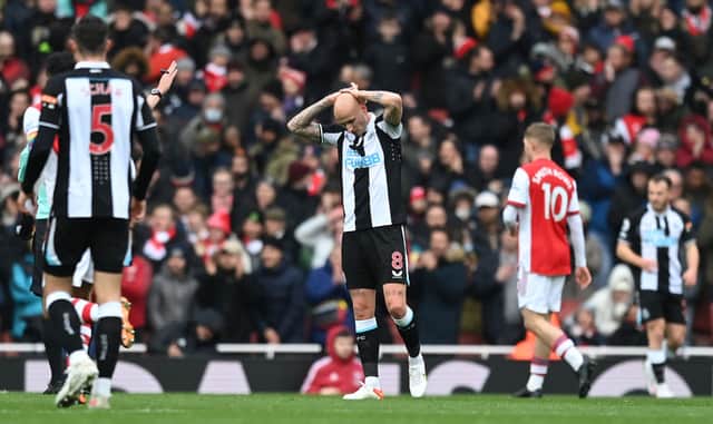 Jonjo Shelvey of Newcastle United reacts after Aaron Ramsdale of Arsenal (not pictured) makes a save during the Premier League match between Arsenal and Newcastle United. 