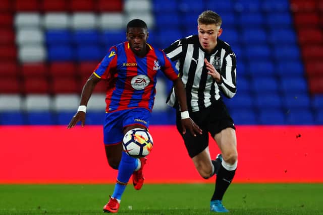 Joseph Hungbo of Crystal Palace avoids a challenge from Lewis Cass of Newcastle during the FA Youth Cup Fourth Round match between Crystal Palace and Newcastle United at Selhurst Park on January 19, 2018 in London, England.
