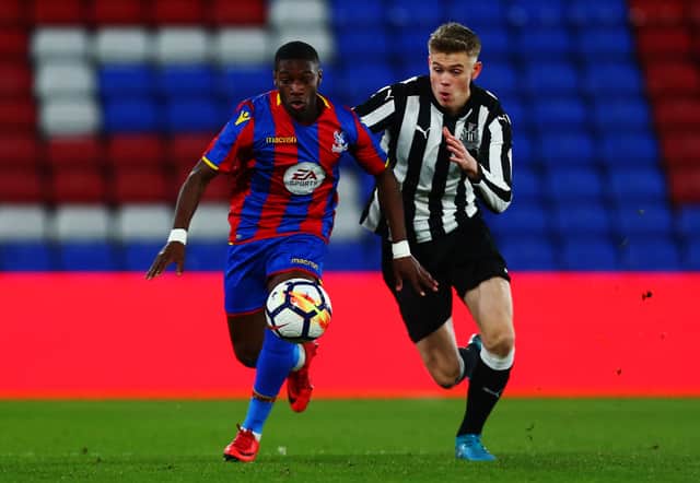 Joseph Hungbo of Crystal Palace avoids a challenge from Lewis Cass of Newcastle during the FA Youth Cup Fourth Round match between Crystal Palace and Newcastle United at Selhurst Park on January 19, 2018 in London, England.  