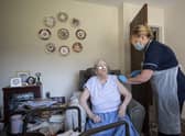 A vaccine is administered in a UK care home (Image: Getty Images)