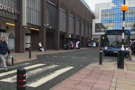 Picture of a bus and bus stops in Newcastle