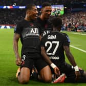 Paris Saint-Germain’s Senegalese midfielder Idrissa Gueye (R) celebrates with Paris Saint-Germain’s French defender Presnel Kimpembe (L) and Paris Saint-Germain’s French defender Abdou Diallo (C) after scoring a goal during the French L1 football match between Paris Saint-Germain (PSG) and Montpellier.