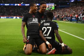 Paris Saint-Germain’s Senegalese midfielder Idrissa Gueye (R) celebrates with Paris Saint-Germain’s French defender Presnel Kimpembe (L) and Paris Saint-Germain’s French defender Abdou Diallo (C) after scoring a goal during the French L1 football match between Paris Saint-Germain (PSG) and Montpellier.