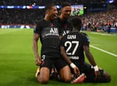 Paris Saint-Germain’s Senegalese midfielder Idrissa Gueye (R) celebrates with Paris Saint-Germain’s French defender Presnel Kimpembe (L) and Paris Saint-Germain’s French defender Abdou Diallo (C) after scoring a goal during the French L1 football match between Paris Saint-Germain (PSG) and Montpellier.