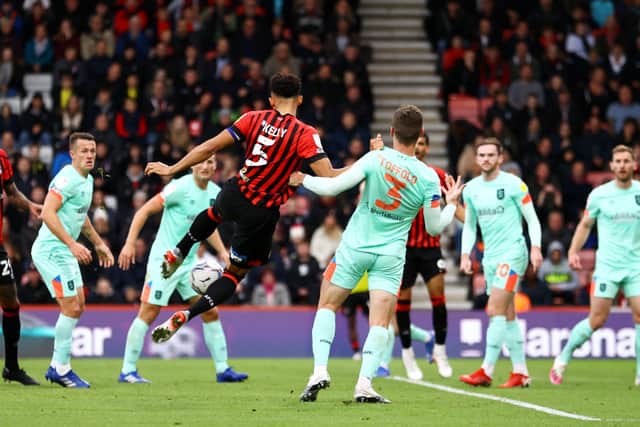 Lloyd Kelly of AFC Bournemouth scores their team’s third goal during the Sky Bet Championship match between AFC Bournemouth and Huddersfield Town at Vitality Stadium on October 23, 2021 in Bournemouth, England.