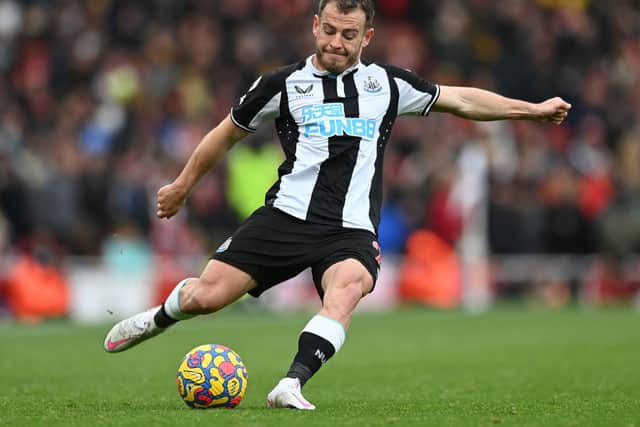 Ryan Fraser of Newcastle United crosses the ball during the Premier League match between Arsenal and Newcastle United at Emirates Stadium on November 27, 2021 in London, England.