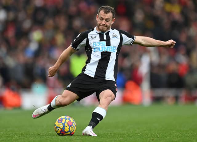 Ryan Fraser of Newcastle United crosses the ball during the Premier League match between Arsenal and Newcastle United at Emirates Stadium on November 27, 2021 in London, England. 