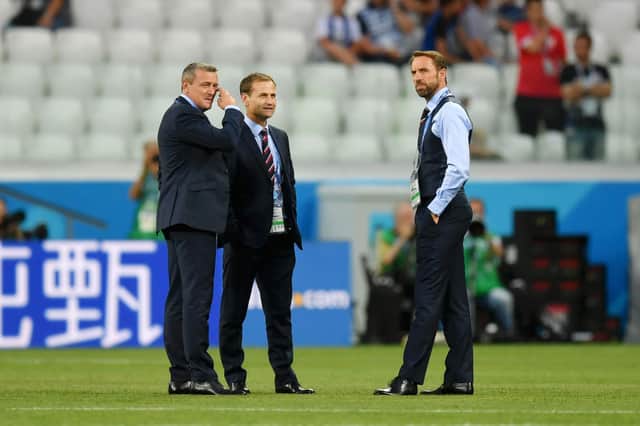 Gareth Southgate, Manager of England, Aidy Boothroyd and Dan Ashworth, FA Director of Elite Development look on prior to the 2018 FIFA World Cup Russia group G match between Tunisia and England at Volgograd Arena on June 18, 2018 in Volgograd, Russia.  