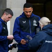 Ciaran Clark and Jamaal Lascelles of Newcastle United have their Covid-19 passes scanned as they arrive at the stadium prior to the Premier League match between Newcastle United and Manchester City at St. James Park on December 19, 2021 in Newcastle upon Tyne, England.