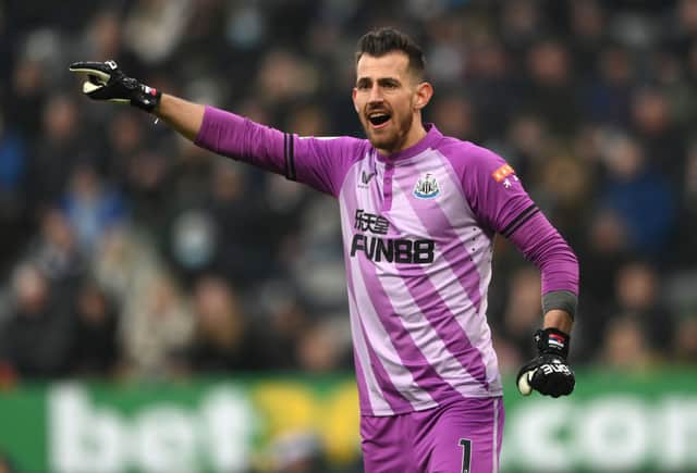 Newcastle goalkeeper Martin Dubravka organises his defence during the Premier League match between Newcastle United  and  Manchester City at St. James Park on December 19, 2021 in Newcastle upon Tyne, England.
