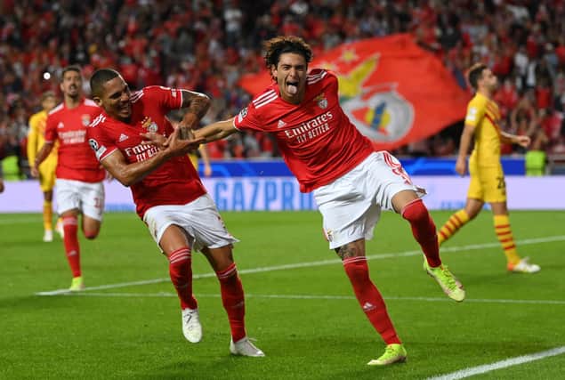 Darwin Nunez of SL Benfica celebrates scoring his sides third goal with Lucas Verissimo during the UEFA Champions League group E match between SL Benfica and FC Barcelona at Estadio da Luz on September 29, 2021 in Lisbon, Portugal. 