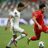 Dhurgham Ismael of Iraq and Sardar Azmoun of Iran battle for the ball during the 2022 FIFA World Cup Qualifier match between Iraq and Iran at Khalifa International Stadium on September 07, 2021 in Doha, Qatar. 