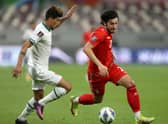Dhurgham Ismael of Iraq and Sardar Azmoun of Iran battle for the ball during the 2022 FIFA World Cup Qualifier match between Iraq and Iran at Khalifa International Stadium on September 07, 2021 in Doha, Qatar. 