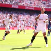 Diego Carlos of Sevilla FC celebrates after scoring their sides third goal during the LaLiga Santander match between Sevilla FC and Levante UD at Estadio Ramon Sanchez Pizjuan on October 24, 2021 in Seville, Spain. 