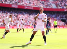 Diego Carlos of Sevilla FC celebrates after scoring their sides third goal during the LaLiga Santander match between Sevilla FC and Levante UD at Estadio Ramon Sanchez Pizjuan on October 24, 2021 in Seville, Spain. 