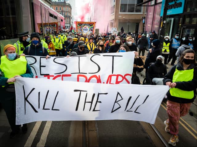 Hundreds of people march through Manchester on the Kill The Bill national day of action. Photo: Andy Barton
