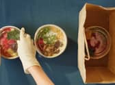 Picture of someone packing vegan food