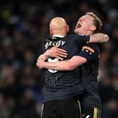 Jonjo Shelvey embraces Sean Longstaff of Newcastle United after their sides victory during the Premier League match between Leeds United and Newcastle United at Elland Road on January 22, 2022 in Leeds, England.