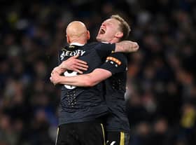 Jonjo Shelvey embraces Sean Longstaff of Newcastle United after their sides victory during the Premier League match between Leeds United and Newcastle United at Elland Road on January 22, 2022 in Leeds, England.