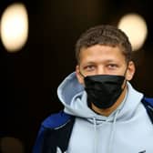 Dwight Gayle of Newcastle United is seen wearing a face mask as he arrives at the stadium prior to the Premier League match between Newcastle United and Manchester City at St. James Park on December 19, 2021 in Newcastle upon Tyne, England.