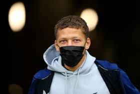 Dwight Gayle of Newcastle United is seen wearing a face mask as he arrives at the stadium prior to the Premier League match between Newcastle United and Manchester City at St. James Park on December 19, 2021 in Newcastle upon Tyne, England.