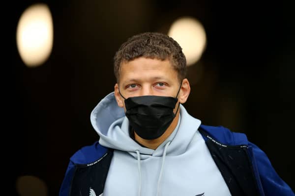 Dwight Gayle of Newcastle United is seen wearing a face mask as he arrives at the stadium prior to the Premier League match between Newcastle United and Manchester City at St. James Park on December 19, 2021 in Newcastle upon Tyne, England.