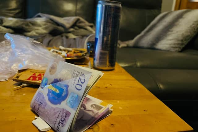 A loot of drugs and cash was uncovered