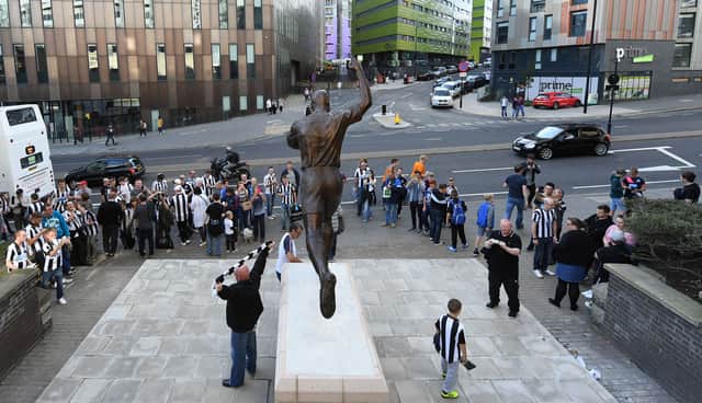 The statue is currently closer to the road then the stadium (Image: Getty Images)