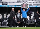 Newcastle United winger Ryan Fraser pictured alongside former head coach Steve Bruce.