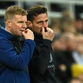 Newcastle United’s head coach Eddie Howe (L) and his assistant Jason Tindall gesture on the touchline.