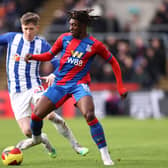 Eberechi Eze of Crystal Palace is challenged by Tom Crawford of Hartlepool United during the Emirates FA Cup Fourth Round match between Crystal Palace and Hartlepool United at Selhurst Park on February 05, 2022 in London, England