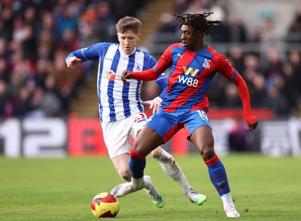 <p>Eberechi Eze of Crystal Palace is challenged by Tom Crawford of Hartlepool United during the Emirates FA Cup Fourth Round match between Crystal Palace and Hartlepool United at Selhurst Park on February 05, 2022 in London, England</p>