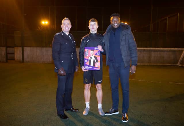 Newcastle United’s Premier League Kicks local legend ‘Lilly’ with Chief Constable of Northumbria Police Winton Keenen (L) and NU Foundation Ambassador Shola Ameobi (R)