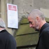 NEWCASTLE UPON TYNE, ENGLAND - AUGUST 21:  Barry Sweeney arrives for the funeral of his son, lifelong Newcastle United fan Liam Sweeney, as it takes place at St Mary’s Cathedral on August 21, 2014 in Newcastle Upon Tyne, England. Mr Sweeney, 28, and fellow Newcastle United fan Mr John Alder, 63, died along with 296 others when the Malaysian flight MH17 they were travelling on was shot down over Ukraine on 17 July.  (Photo by Ian Forsyth/Getty Images)