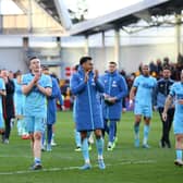 Matt Targett and Joe Willock of Newcastle United applauds fans after their sides victory during the Premier League match between Brentford and Newcastle United at Brentford Community Stadium