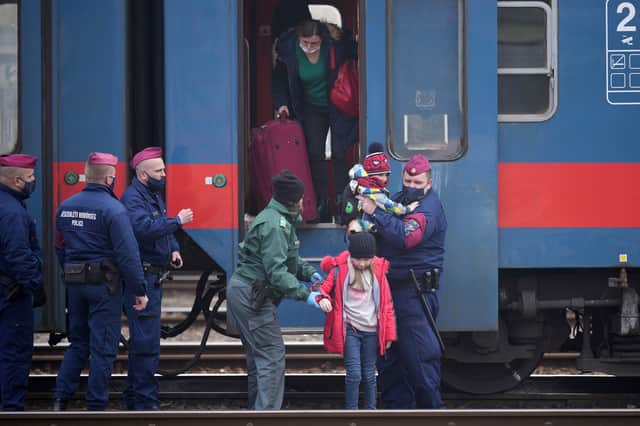 Ukrainian refugees arrive at the Hungarian border (Image: Getty Images)