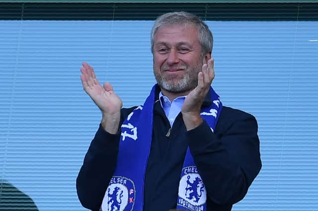 Chelsea’s Russian owner Roman Abramovich applauds, as players celebrate their league title win at the end of the Premier League football match between Chelsea and Sunderland at Stamford Bridge in London on May 21, 2017.