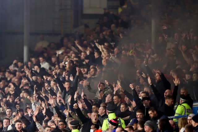 LEEDS, ENGLAND - JANUARY 22: Newcastle United fans celebrate their first goal during the Premier League match between Leeds United and Newcastle United at Elland Road on January 22, 2022 in Leeds, England. (Photo by George Wood/Getty Images)