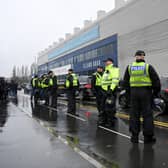LEEDS, ENGLAND - FEBRUARY 20: Police officers are seen outside the stadium prior to the Premier League match between Leeds United and Manchester United at Elland Road on February 20, 2022 in Leeds, England. (Photo by Shaun Botterill/Getty Images)