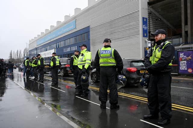 LEEDS, ENGLAND - FEBRUARY 20: Police officers are seen outside the stadium prior to the Premier League match between Leeds United and Manchester United at Elland Road on February 20, 2022 in Leeds, England. (Photo by Shaun Botterill/Getty Images)