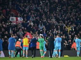 Newcastle United celebrate with their fans after the final whistle of the Premier League match between Southampton and Newcastle United at St Mary's Stadium on March 10, 2022 in Southampton, England.  