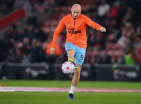 Jonjo Shelvey of Newcastle United warms up before the Premier League match between Southampton and Newcastle United at St Mary’s Stadium on March 10, 2022 in Southampton, England. 